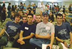 Guys eagerly awaiting the start of a talk