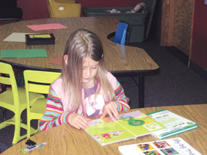 Abby reading her picture book